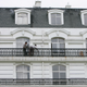 Workers fix an apartment building in Tianducheng development, China.